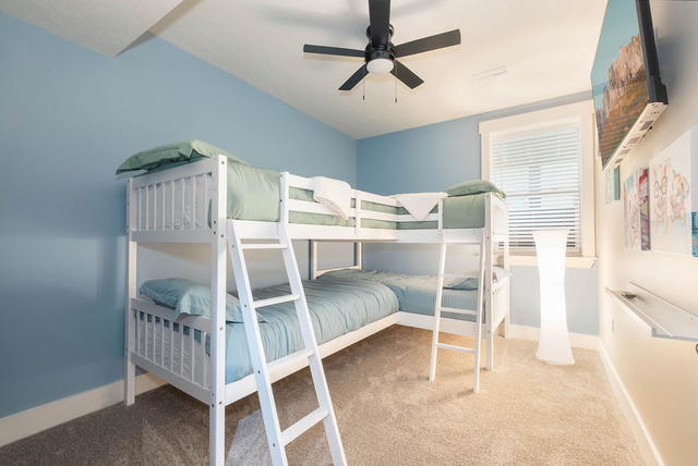 L-shaped twin bunks that sleep four — the cousins' room, or wherever the kids cl